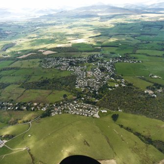 General oblique aerial view centred on the village, taken from the SE.