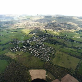 General oblique aerial view centred on the village, taken from the WNW.