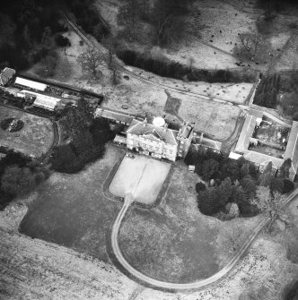 Oblique aerial view from SE.