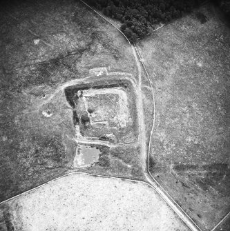 Oblique aerial view centred on castle from N.