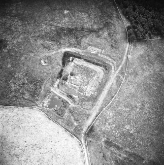 Oblique aerial view centred on castle from N.