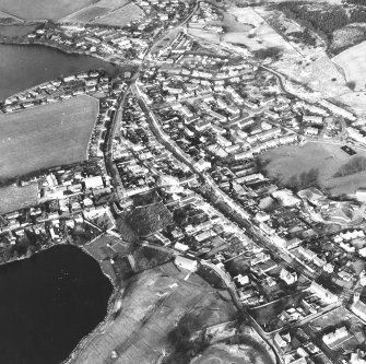 Oblique aerial view centred on town hall from SW.