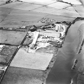 Oblique aerial view centred on boiler works from SE.