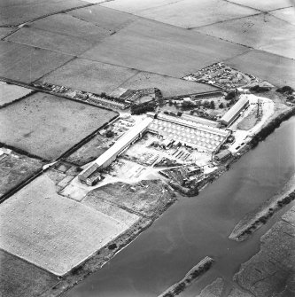 Oblique aerial view centred on boiler works from SE.