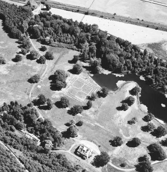 Oblique aerial view centred on gardens from SW.