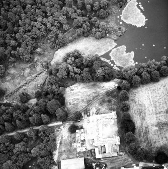 Aerial view of stable and fishpond.