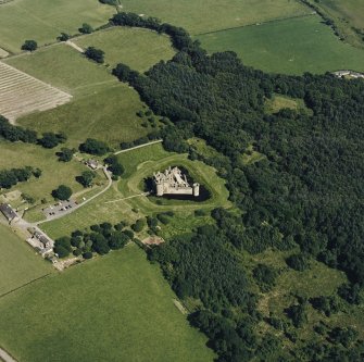 Oblique aerial view of Caerlaverock Castle from NW.