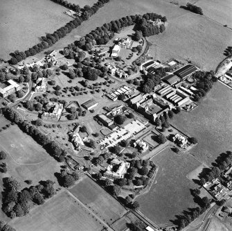 Oblique aerial view centred on the hospital, taken from the WNW.