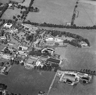 Oblique aerial view centred on the hospital, taken from the SW.
