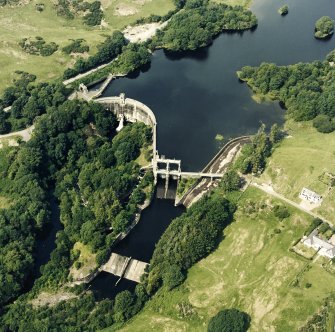 Oblique aerial view of Tongland Dam, taken from S, centered on dam.