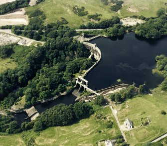 Oblique aerial view of Tongland Dam, taken from SE, centered on dam.