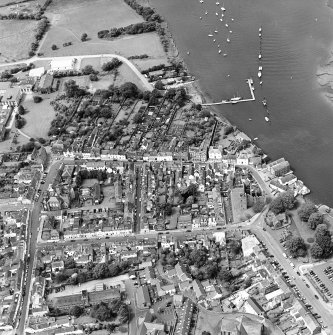 Oblique aerial view of Kirkcudbright centred on MacLellan's Tower, taken from the SE.