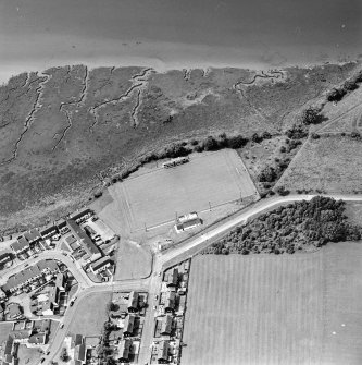 Oblique aerial view of Kirkcudbright, St Mary's Park, centred on a football ground, taken from the ESE.