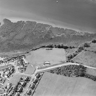 Oblique aerial view of Kirkcudbright, St Mary's Park, centred on a football ground, taken from the ENE.