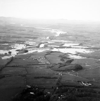 General oblique aerial view looking across Kelton Mains and Threave Castle along the River Dee during flood, taken from the ESE