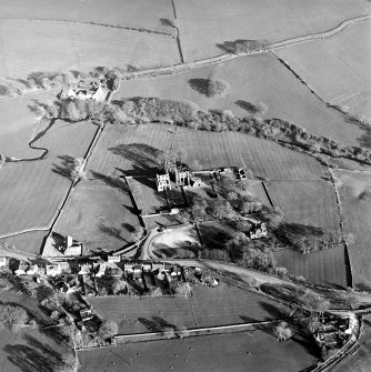 Oblique aerial view centred on the abbey and manse, taken from the WNW.
