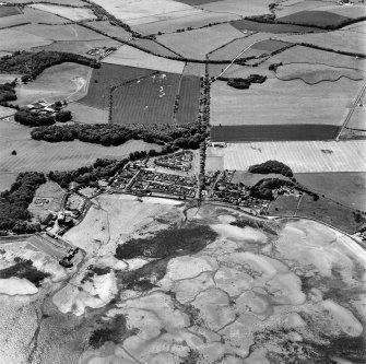 Garlieston, oblique aerial view, taken from the ENE, centred on the village and harbour.