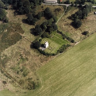 Oblique aerial view centred on the tower-house, taken from the WSW.