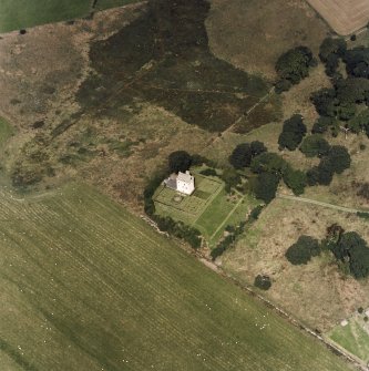 Oblique aerial view centred on the tower-house, taken from the S.