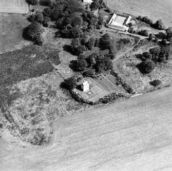 Oblique aerial view centred on the tower-house, taken from the WSW.