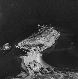 Inchcolm Island, oblique aerial view, taken from the WNW, showing Inchcolm Abbey and three coastal batteries.