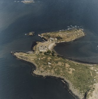 Inchcolm Island, oblique aerial view, taken from the W, showing Inchcolm Abbey and four coastal batteries.