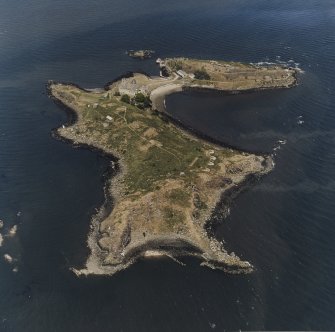 Inchcolm Island, oblique aerial view, taken from the W, showing a general view of the island, with Inchcolm Abbey and four coastal batteries visible.