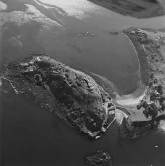 Oblique aerial view centred on the coast batteries with abbey adjacent, taken from the N.