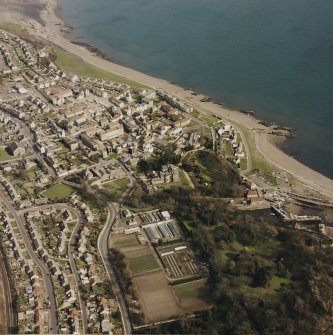 Oblique aerial view of Dysart centred on the village housing redevelopment designed by Wheeler and Sproson in 1958-71, and recorded as part of the Wheeler and Sproson Project and a Threatened Building Survey completed in 1997.  Taken from the WSW.