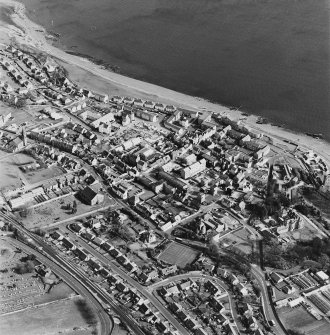 Oblique aerial view of Dysart centred on the village housing redevelopment designed by Wheeler and Sproson in 1958-71, and recorded as part of the Wheeler and Sproson Project and a Threatened Building Survey completed in 1997.  Taken from the W.