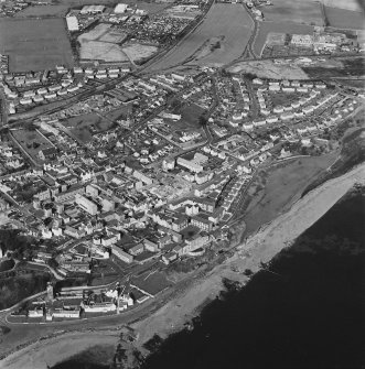 Oblique aerial view of Dysart centred on the village housing redevelopment designed by Wheeler and Sproson in 1958-71, and recorded as part of the Wheeler and Sproson Project and a Threatened Building Survey completed in 1997.  Taken from the SSE.