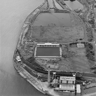 Oblique aerial view centred on East Fife Football Club stadium with power station adjacent, taken from the NNE.