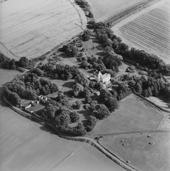 Oblique aerial view centred on the tower-house, taken from the WNW.