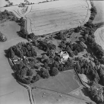 Oblique aerial view centred on the tower-house, taken from the W.
