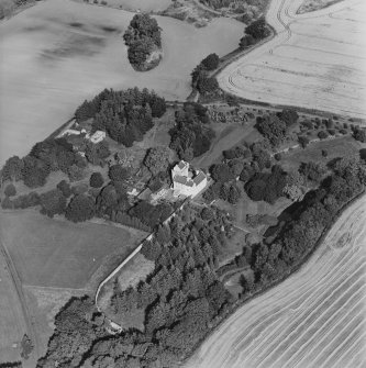 Oblique aerial view centred on the tower-house, taken from the SSW.