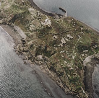 Oblique aerial view of Inchkeith Island centred on the defences, taken from the NNE.