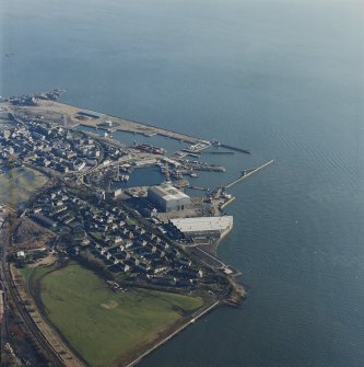Oblique aerial view centred on Burntisland Harbour, taken from the NW.