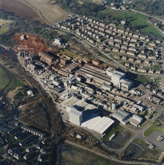 Oblique aerial view centred on the Alumina Works, taken from the SE.