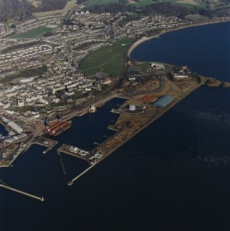 Oblique aerial view centred on Burntisland Harbour, taken from the SW.