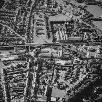 Oblique aerial view centred on the electricity substation with the works adjacent, taken from the SSE.