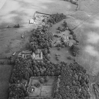 Oblique aerial view of Strathenry country house, dovecot, tower house and north lodge, taken from the W.