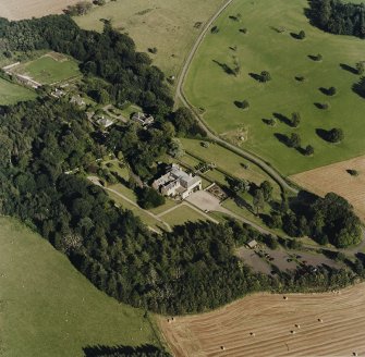 Oblique aerial view of Hill of Tarvit centred on the country house and garden, taken from the WNW.