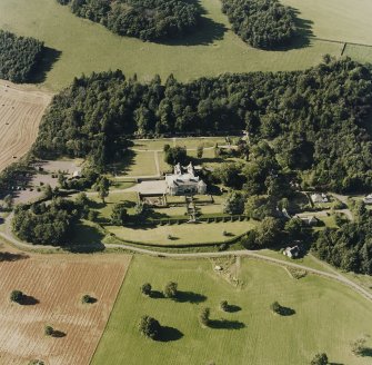 Oblique aerial view of Hill of Tarvit centred on the country house and garden, taken from the SSE.