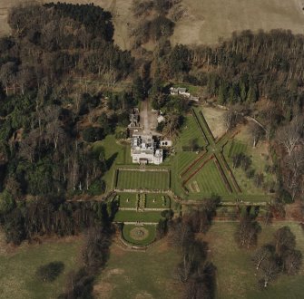 Oblique aerial view of Charleton House centred on a country house, taken from the SSE.