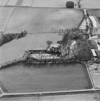 Oblique aerial view of Kellie Castle centred on the castle, taken from the N.