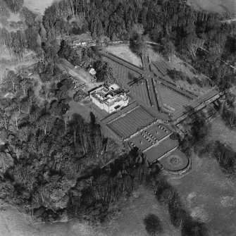 Oblique aerial view of Charleton House centred on a country house, taken from the S.