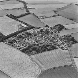 Oblique aerial view centred on the village of Kingsbarns, taken from the NNE.