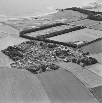 Oblique aerial view centred on the village of Kingsbarns, taken from the W.