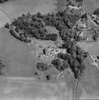 Oblique aerial view centred on the country house, taken from the SW.