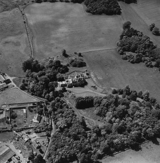 Oblique aerial view centred on the country house, taken from the E.